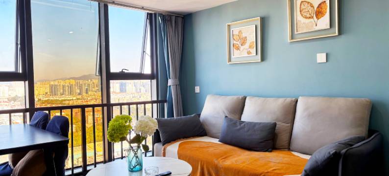 以礼娜姑民宿(云南财经大学龙泉校区万彩城店)图片