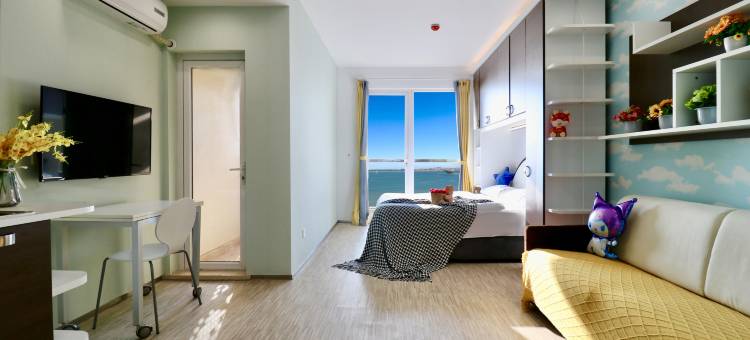 栖海·设计师魔法温泉主题海景公寓(山海广场店)图片