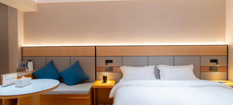 自然醒酒店(万达广场牡丹广场地铁站店)图片