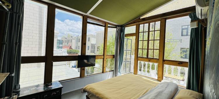 穹恰民宿(扎基寺店)图片