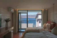 Lugu Lake South Island Villa Resort Hotel - Bãi đậu xe