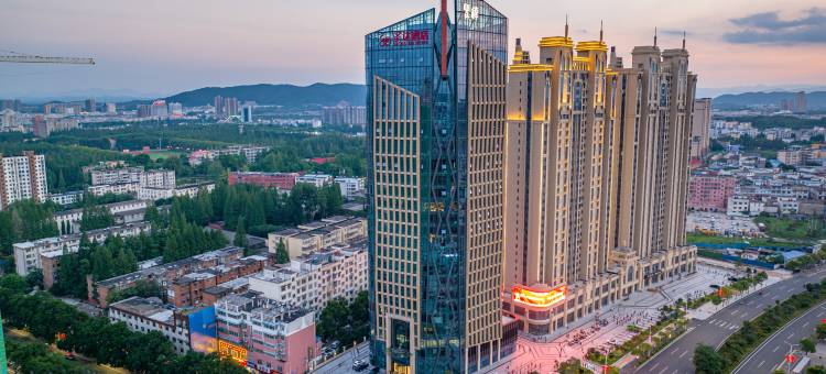 信阳圣达酒店(火车站店)图片