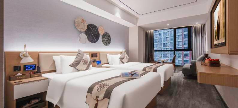 咖曼酒店(万象城六沟垅地铁站店)图片