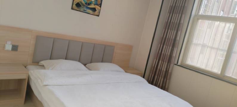 泗水都市商务宾馆图片