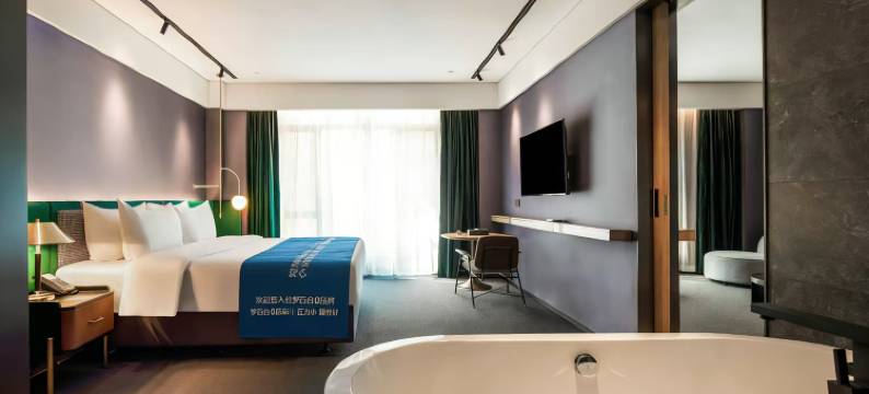 天龙湾曼悦酒店(百色站万景城夜市店)图片