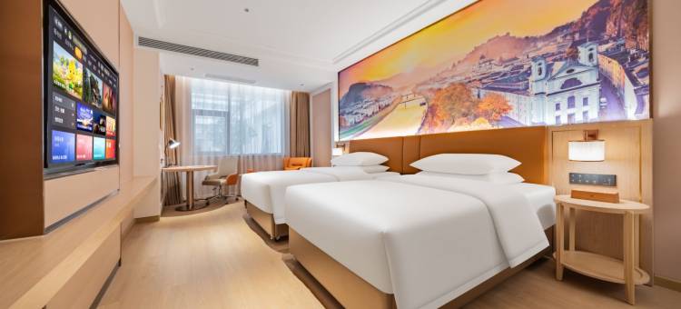 维也纳酒店(汽博中心金童路地铁站店)图片