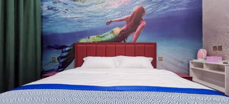 客溢居主题宾馆图片