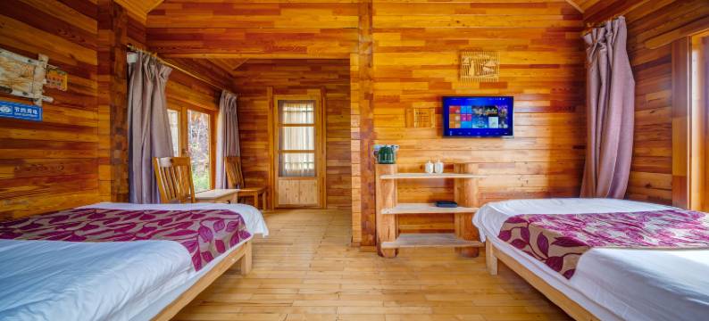 呼伦贝尔根河根林木屋宾馆图片