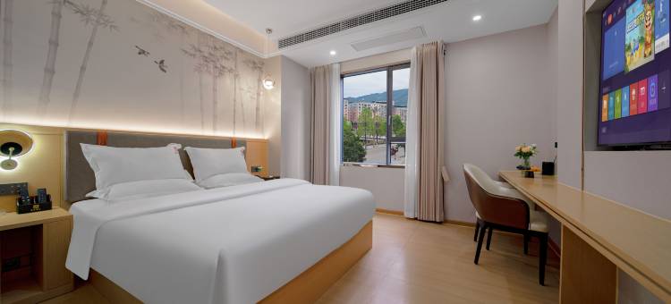 W+盛源酒店(万源市富硒美食城店)图片