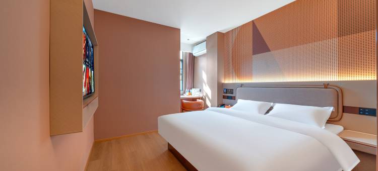 金桔酒店(联盛快乐城火车站店)图片