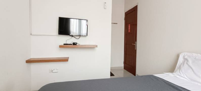 维斯玛阿尔伊曼酒店-由努萨林克管理(Wisma Al Iman Syariah 25 Mitra RedDoorz)图片