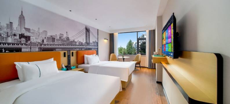 米卡庭院酒店(南阳府衙步行街火车站店)图片