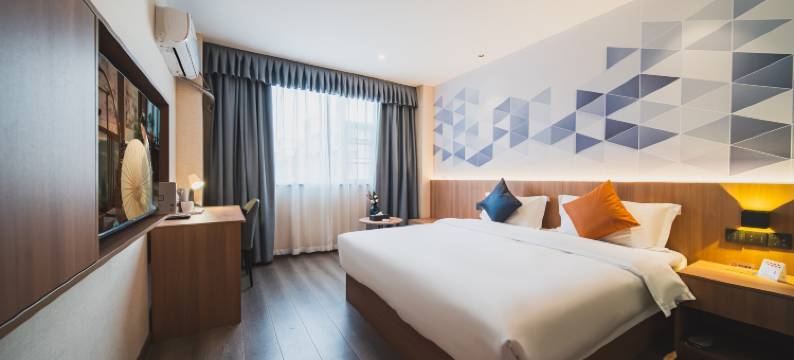 曼客阳光酒店(四川护理职业学院万达广场店)图片