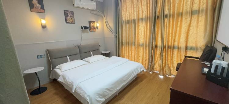 四月天宾馆(镇江火车站万达广场店)图片