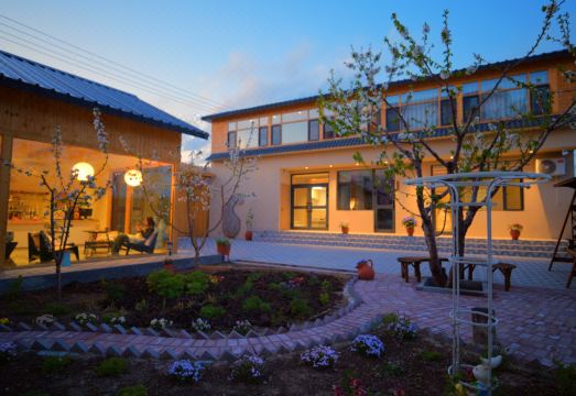 特克斯仟山晓民宿外景图