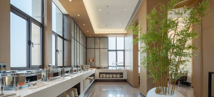 荣成山海云光酒店(体育中心樱花湖店)图片