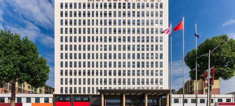 信阳宝鹏广场美居酒店图片