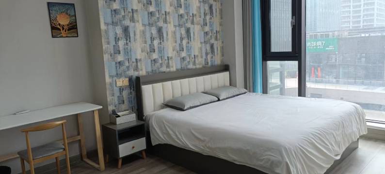 青岛奇艺度假民宿(凯丰星光荟店)图片