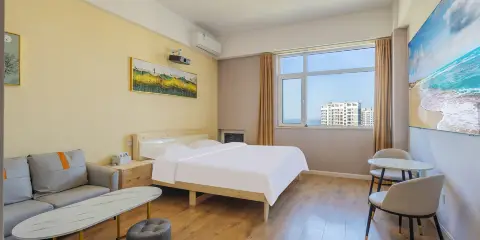 雲光澗畔影音民宿(煙台大學萬象匯店)