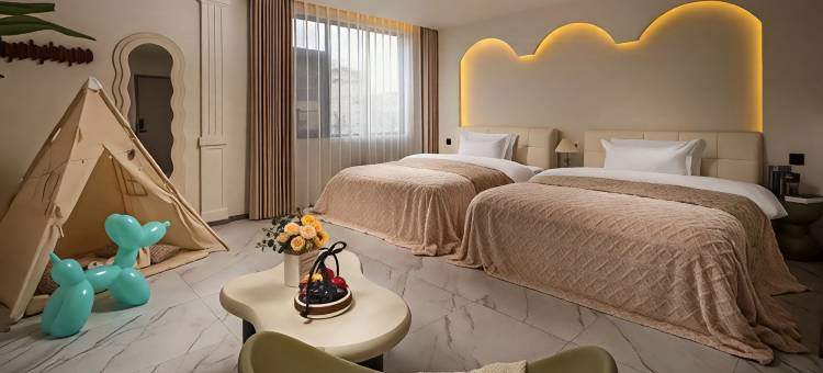 南风知意·French Touch漫度供氧酒店(月光广场大佛寺转经筒店)图片