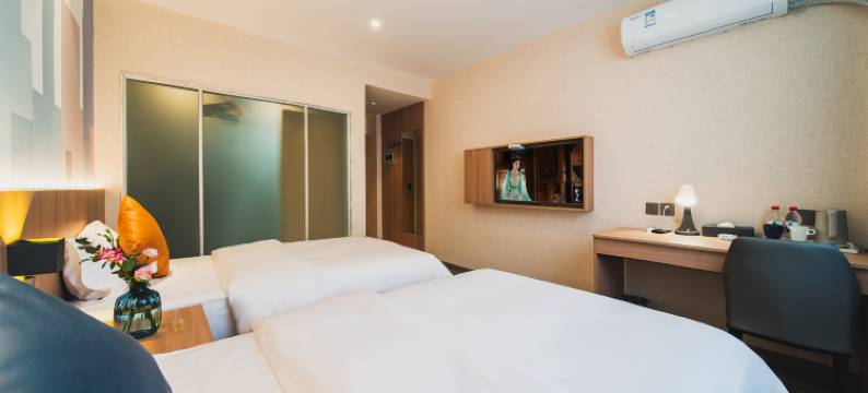 曼客阳光酒店(四川护理职业学院万达广场店)图片