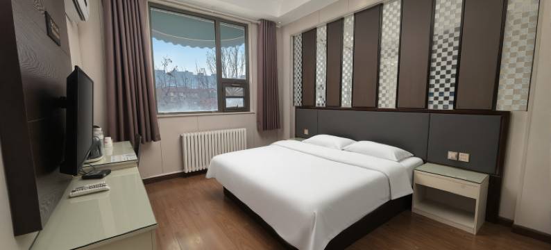 曼卡金苹果酒店(费县东方购物广场店)图片