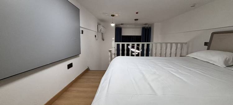 沐风•轻奢影院loft公寓(力高雍湖国际鱼尾洲地铁站店)图片