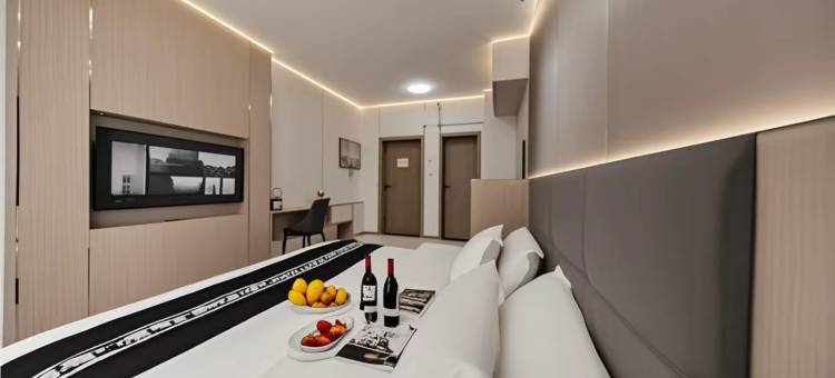 曼朵轻奢智能影音酒店(威海火炬八街国际海水浴场店)图片