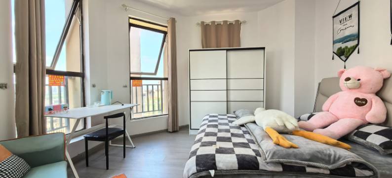 亿间居(阳光半岛店)图片