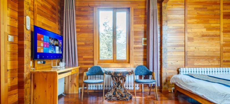 呼伦贝尔根河根林木屋宾馆图片