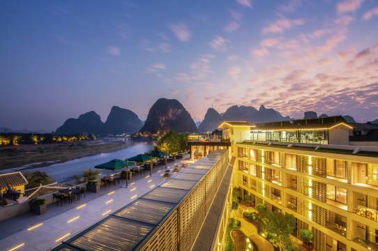漓岸璞闲PERCENT HOTEL文旅酒店(阳朔西街漓江店)图片