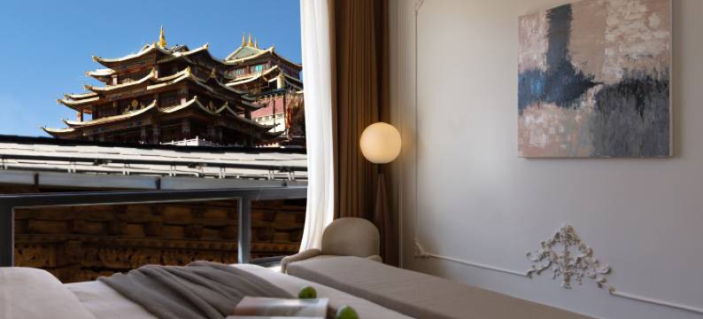 逸馨·月下尘世HYGGE|空间艺术酒店(独克宗古城大佛寺转经筒店)图片