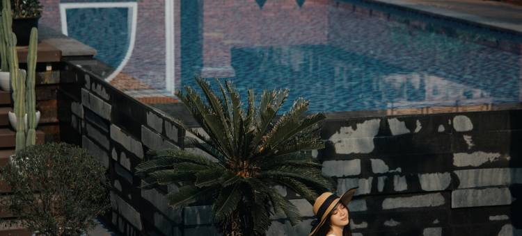 西双版纳景洪萨度•澜湄听涛度假酒店(曼听御花园泼水广场店)图片