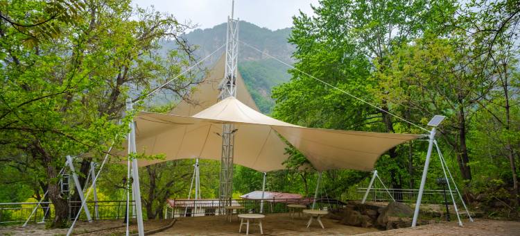 漫山花溪谷酒店图片