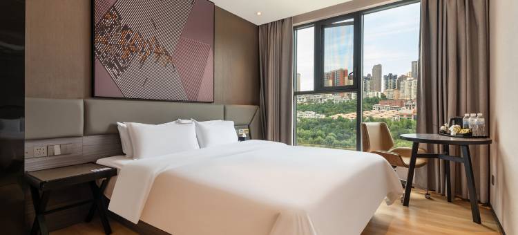 IU酒店(盘州东湖公园红果小广场店)图片