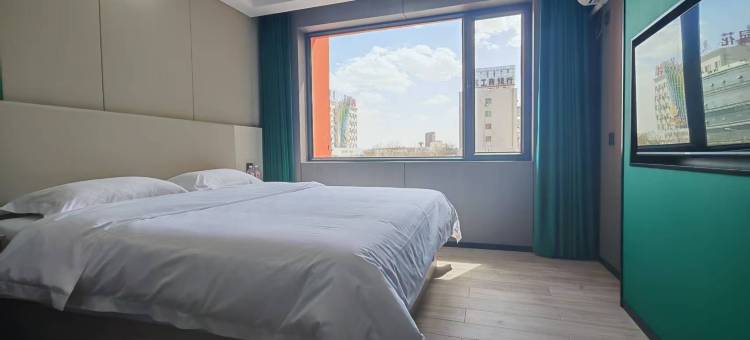 星橙酒店(巴彦淖尔维多利摩尔城店)图片