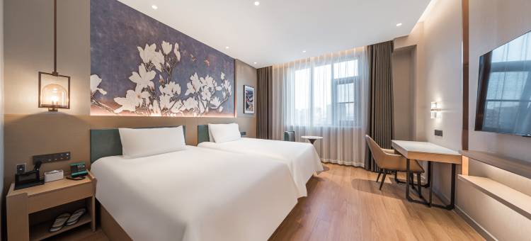 白玉兰酒店(塔城地区乌苏火车站九莲泉公园店)图片