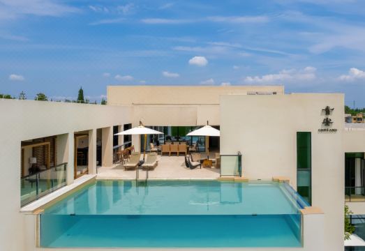 新都香投·青安稻田酒店外景图