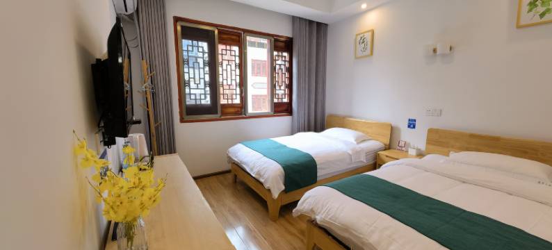 百里杜鹃花开正好客栈图片