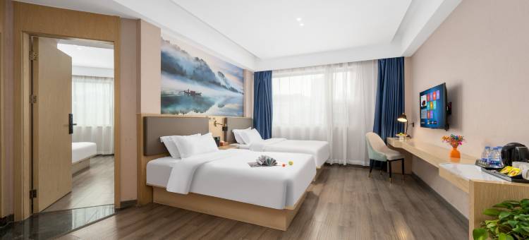 美凯德酒店(湘南学院店)图片