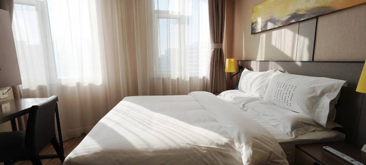 百合培训中心酒店(沈阳北站中医药大学地铁站店)图片