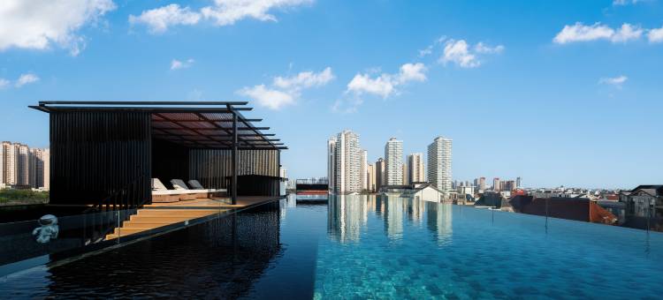 北海及酒店(北海银滩景区侨港风情街店)图片