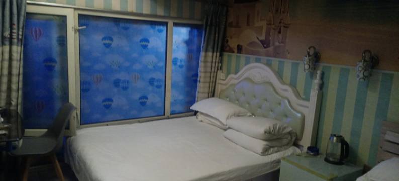 印象青春宾馆(万达店)图片