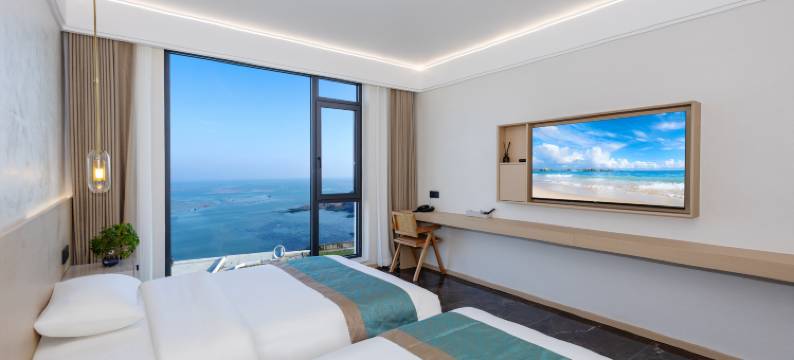 荣成凤栖海岸假日酒店(西霞口动物园店)图片