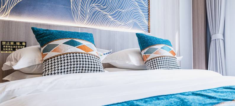 民航金盛国际康养酒店(兴义桔山广场梦乐城购物中心店)图片