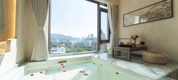 烟雨居影院度假民宿(西双版纳景洪告庄西双景星光夜市店)图片