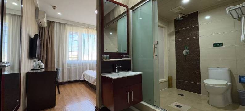 春天连锁宾馆(哈尔滨哈东站地铁站工程学院店)图片