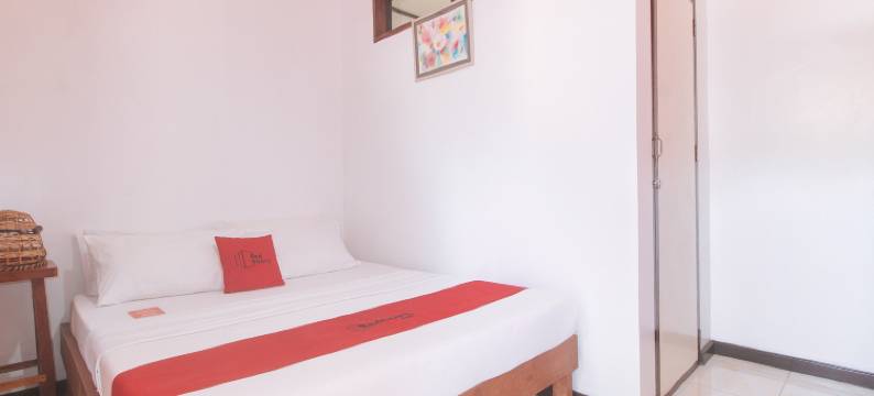 坦迪坎海滩小屋(RedDoorz @ Tandikan Beach Cottages)图片