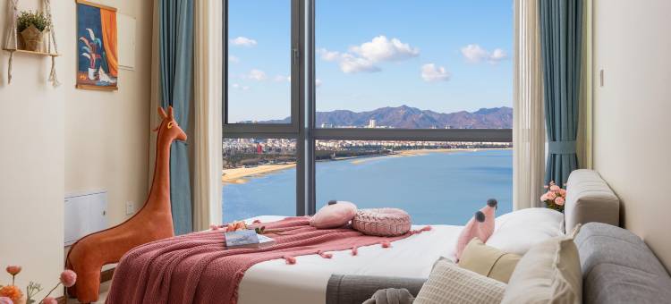 雅居海LOFT海景公寓(威海站华发九龙湾店)图片
