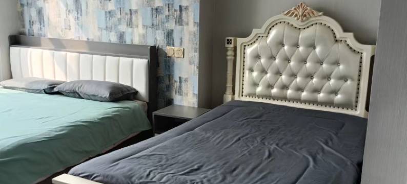 青岛奇艺度假民宿(凯丰星光荟店)图片